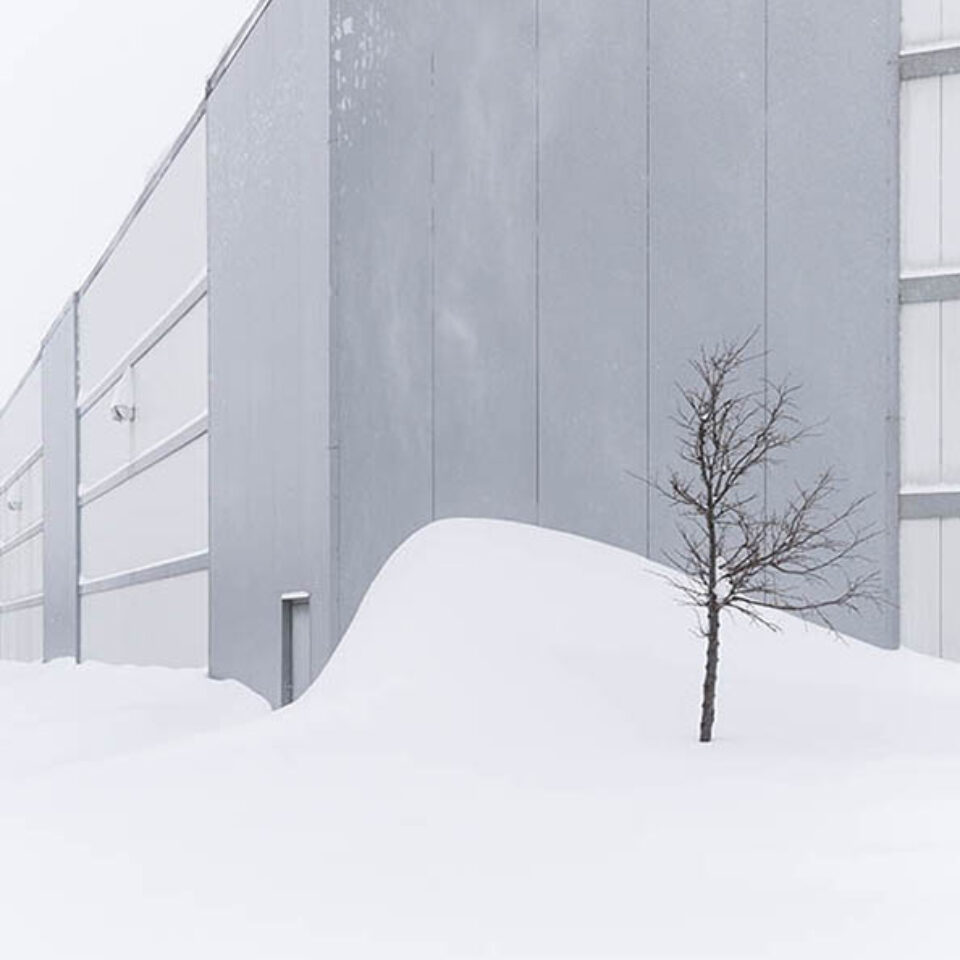 Industrial building architectural photography in winter snowdrift