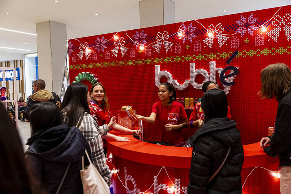 Visitors to the Bubly christmas stand in Montreal