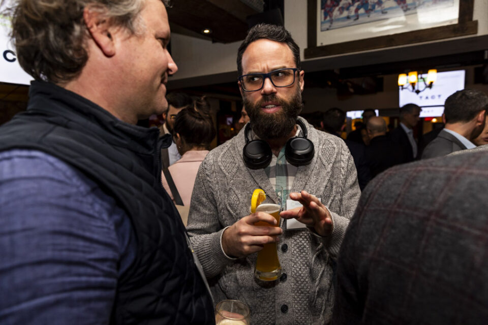 Delegates in conversation, Montreal networking event photography