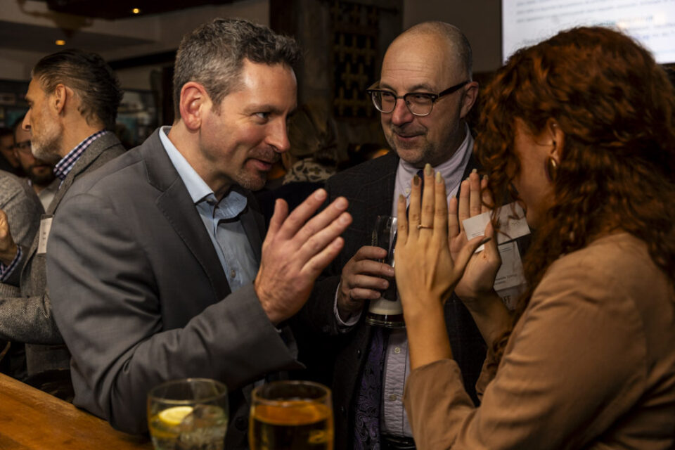 Guests in discussion, Montreal networking event photography