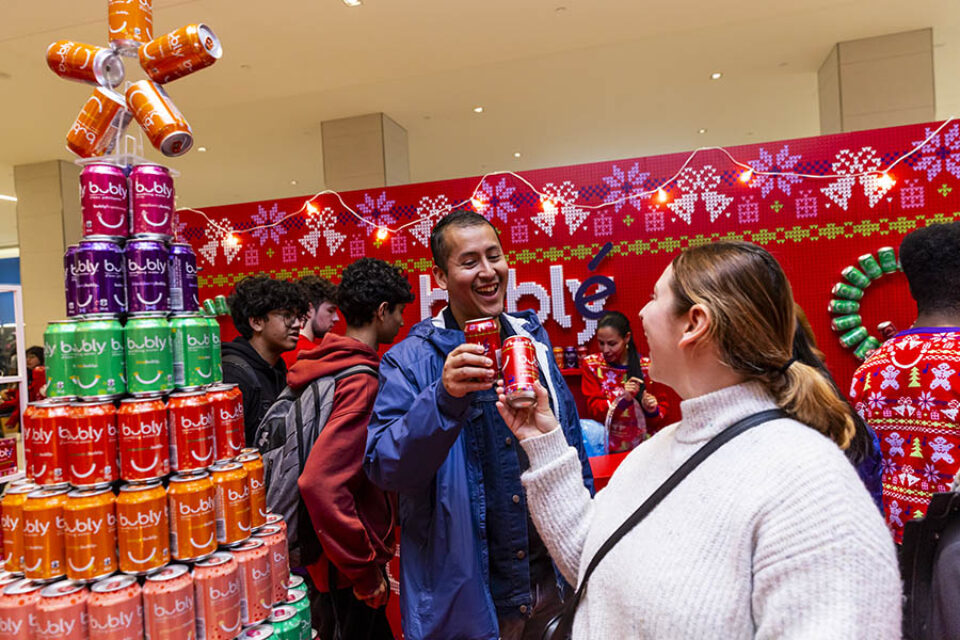 Montreal event visitors cheersing Bubly sparkling water