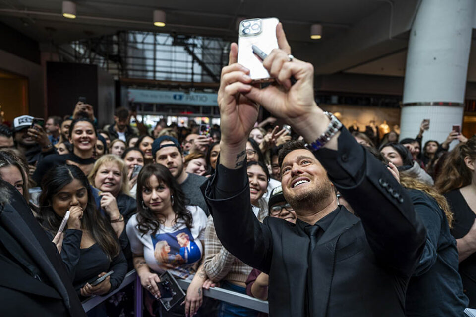 Michael Bublé takes fan selfie at his Toronto event