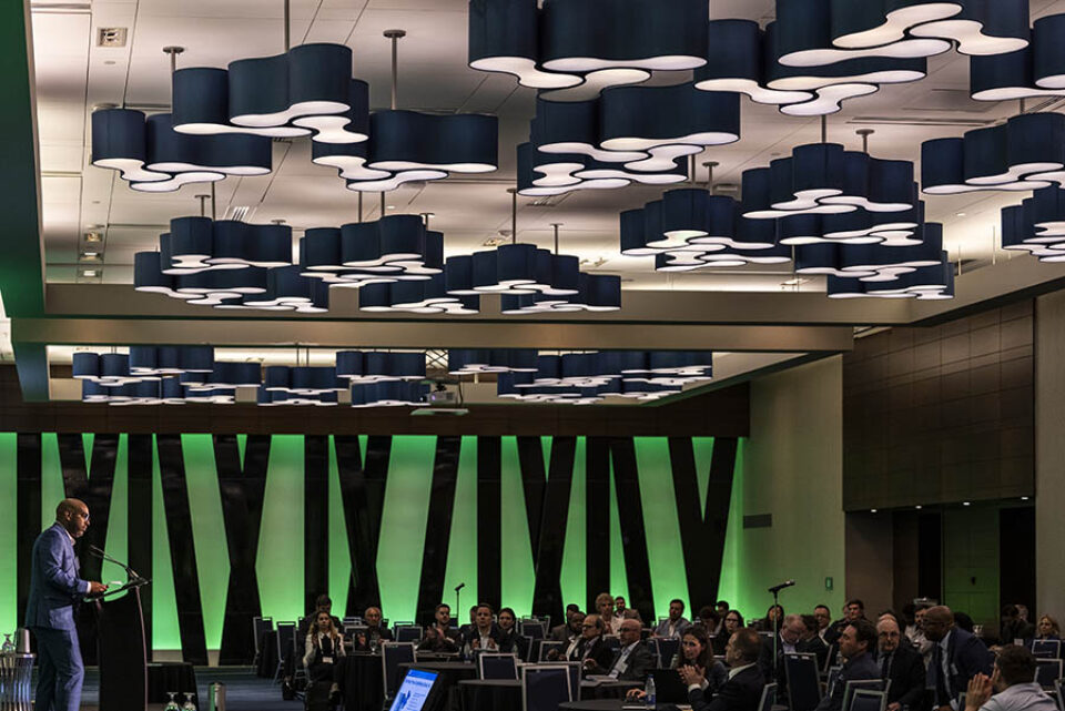 Speaker onstage at a corporate event in Montreal