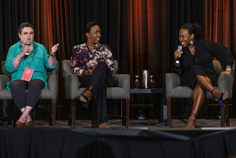 Event panelists in discussion by Montreal event photographer