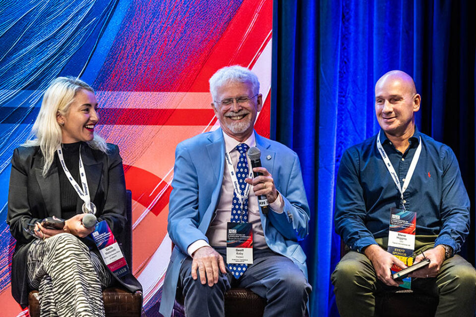 Panelists laughing, Montreal corporate event photography