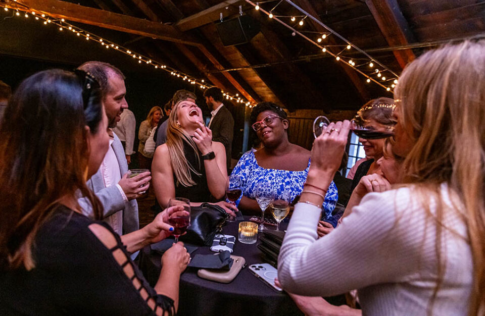 Guests laughing, social evening at a Montreal event