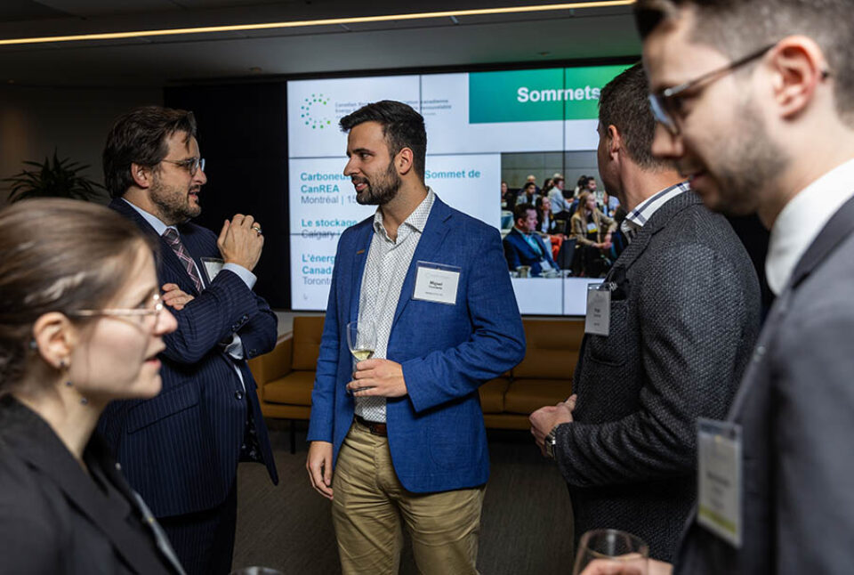 Guests in conversation at a networking event