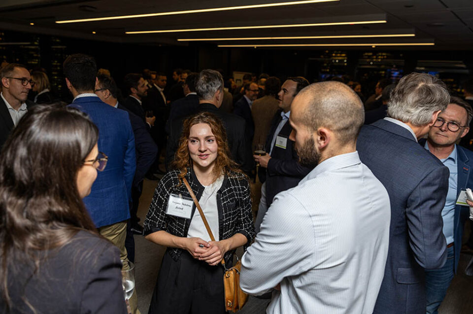 Event attendees chat at a Montreal event