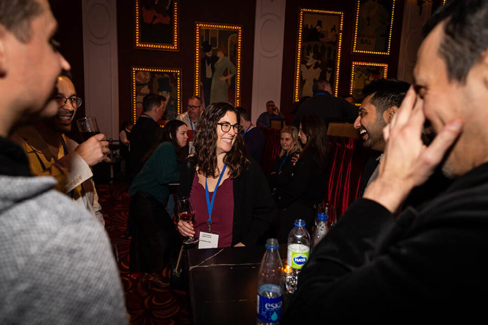 Montreal conference attendees socialising at an evening event