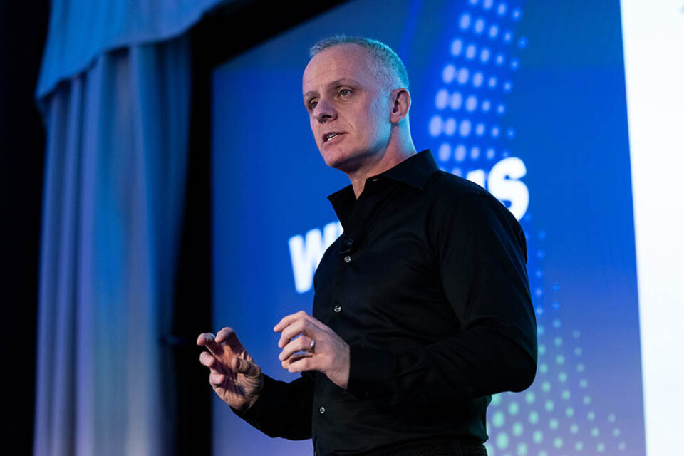 Montreal conference photography, presenter onstage