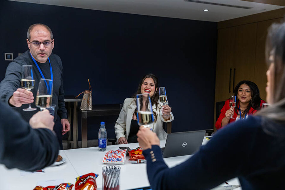 Montreal conference attendees celebrate a promotion