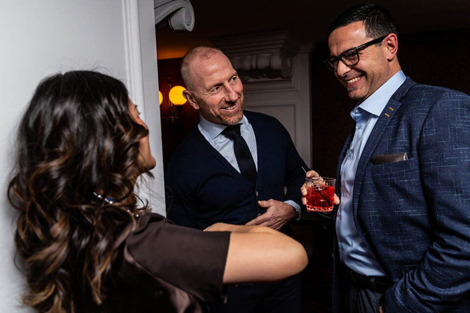 Corporate event attendees enjoying social evening during a Montreal conference