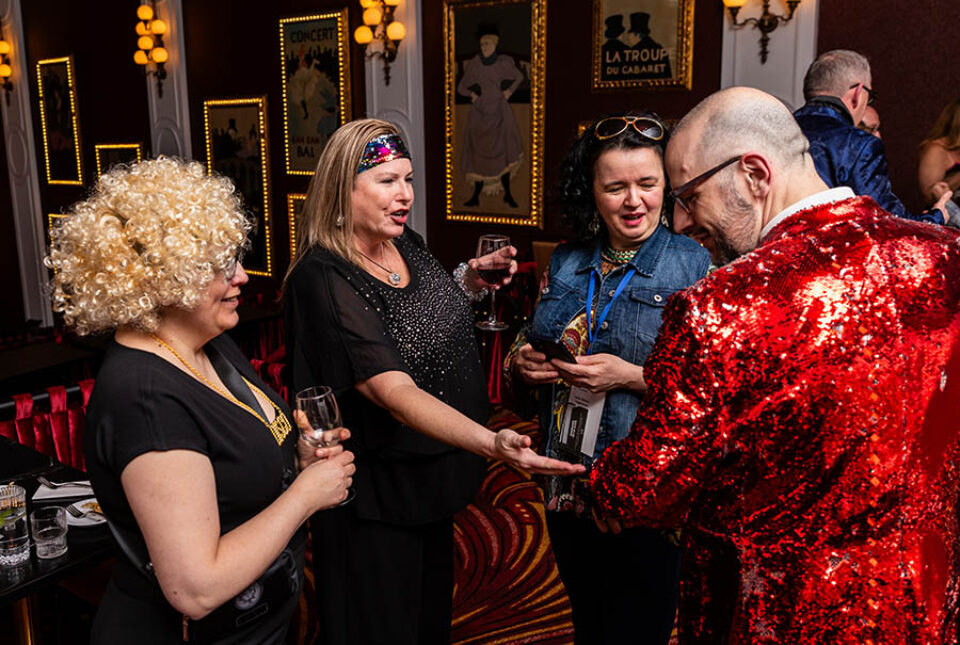 Montreal conference guests admire sequined jacket