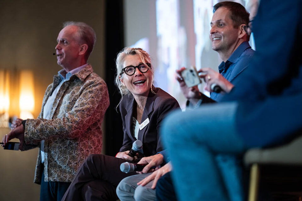 Panel discussion onstage at Montreal conference