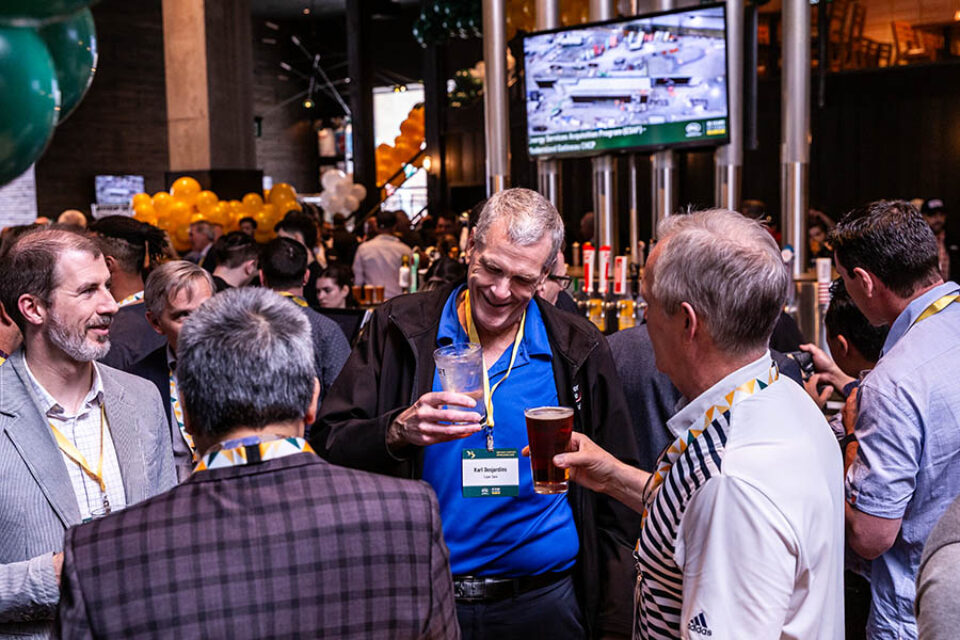 Cheersing guests during corporate celebration held in Ottawa