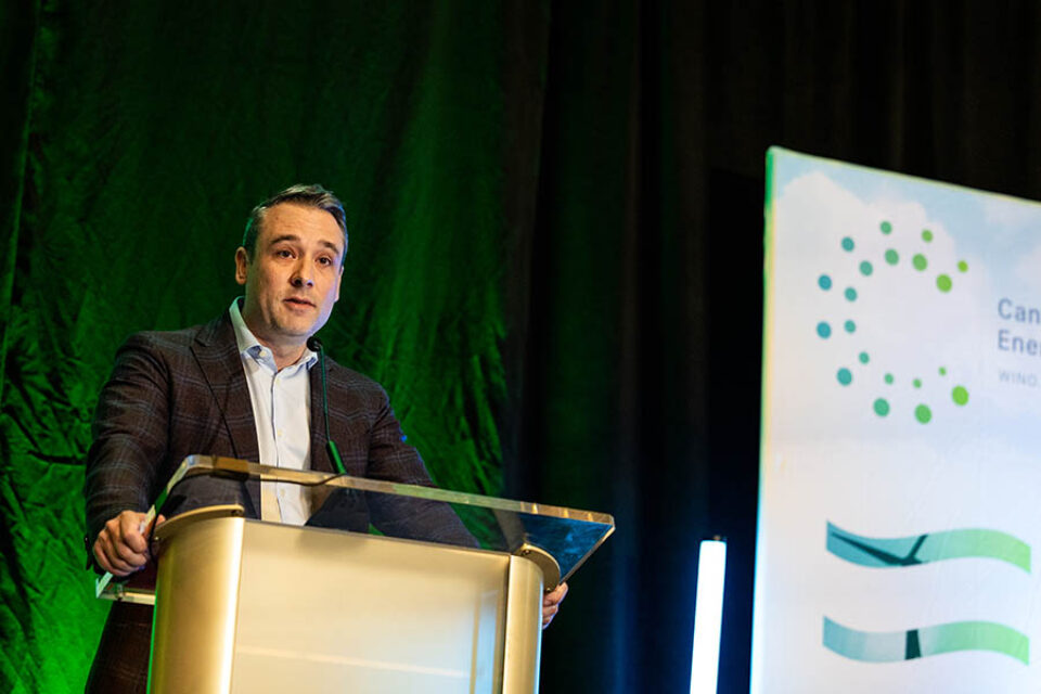 Montreal business event photography presenter gives opening remarks
