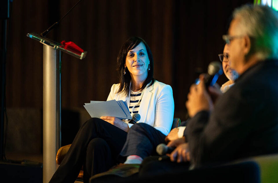 Corporate event photography of fireside chat