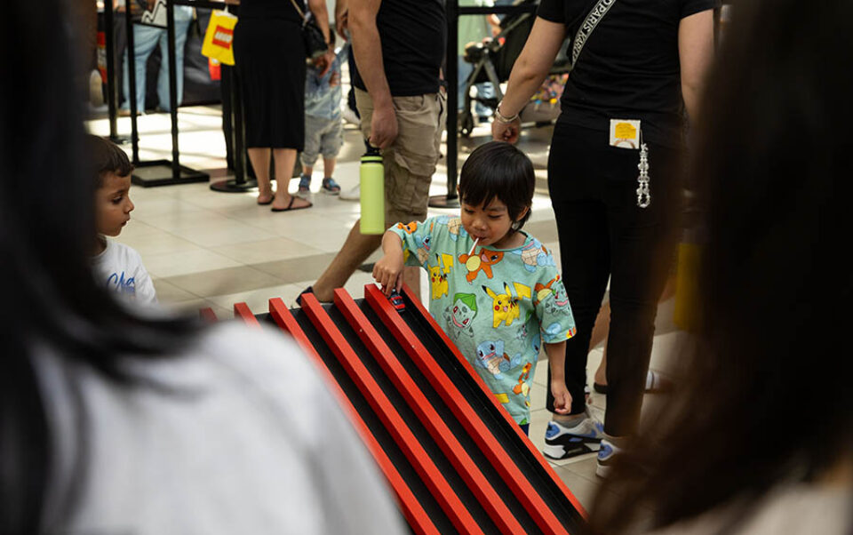 Child plays in brand activation - F1 event photographer Montreal