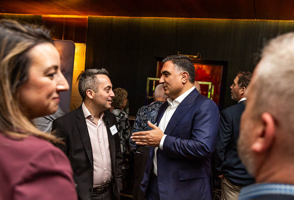 Business celebration guests chatting