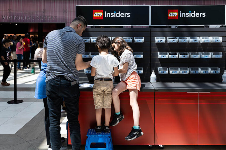 Family at LEGO build station - Canadian GP event photography