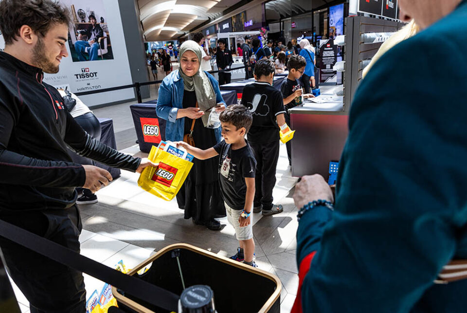Boy handed LEGO merchandise at F1 event in Montreal