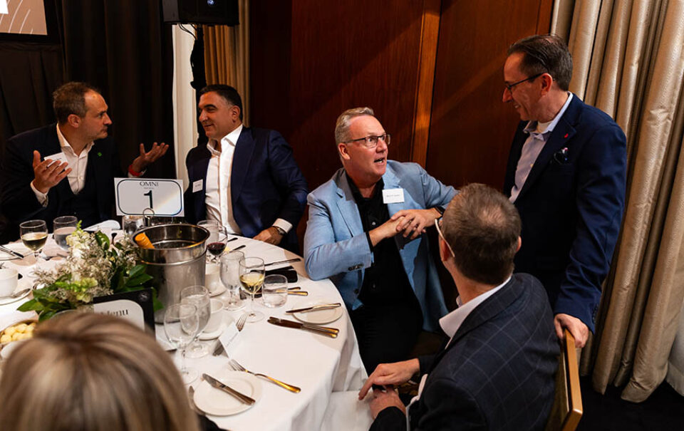 Guests chat during an event in Montreal - business celebration photographer