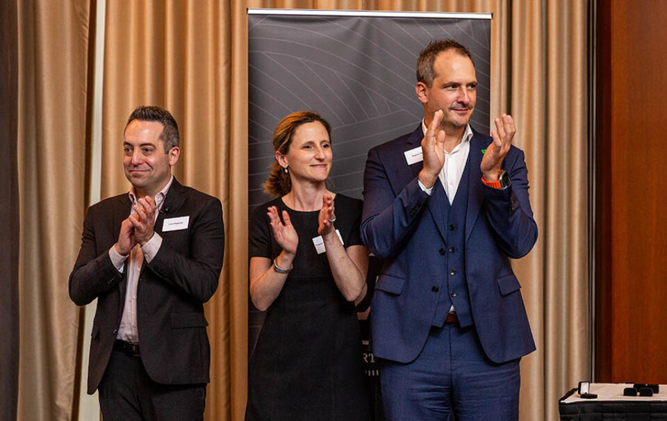 Leaders applaud during award ceremony at an event in Montreal