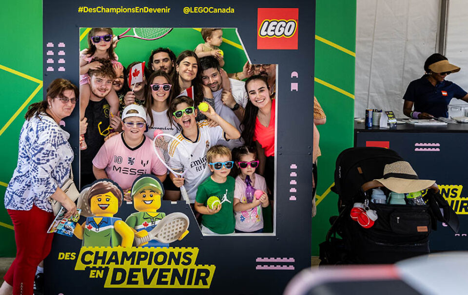 Tennis-themed LEGO photo booth at a sports event in Montreal