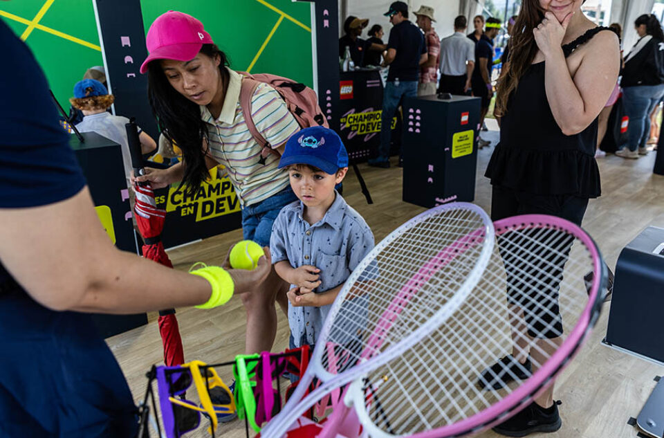 Boy prepares for photo booth at Montreal sports event