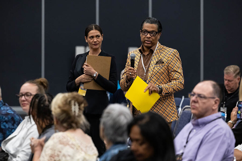 Audience menber asks a question at a Montreal event