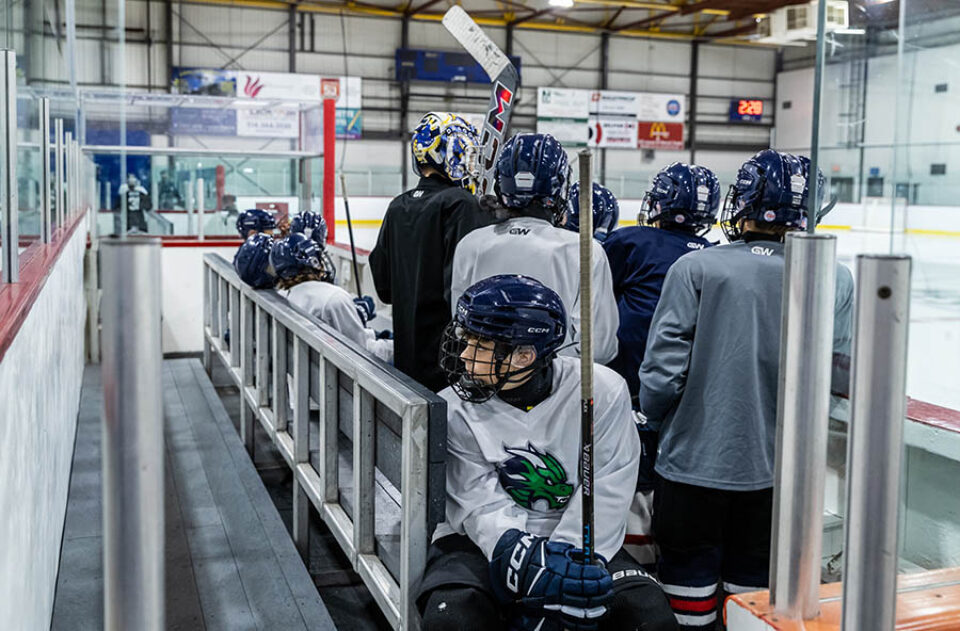 Hockey team waiting to go on the ice, by Montreal sports photographer