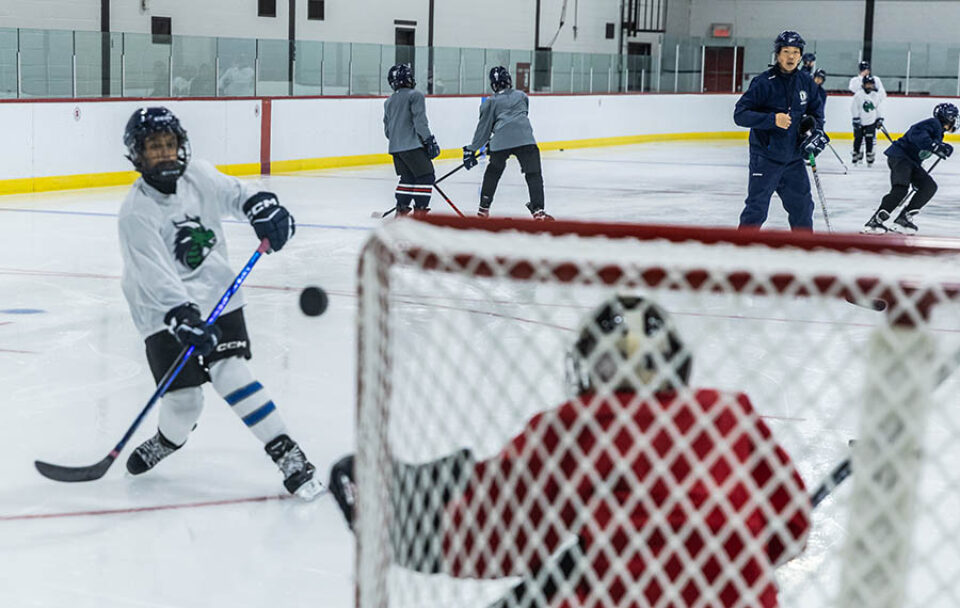 College hockey practice image by Montreal college sports photographer