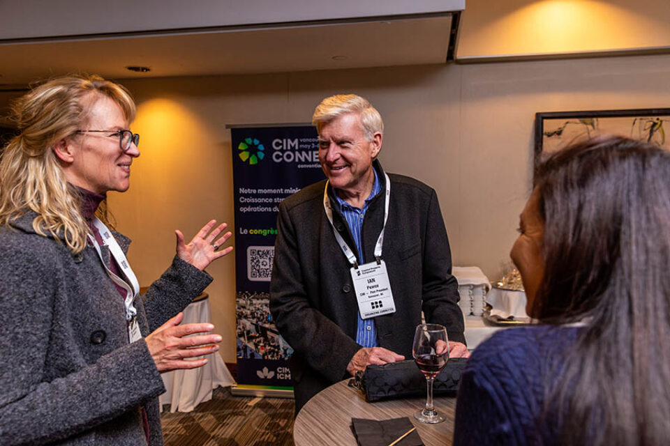 Socialising event guests, Montreal conference photography