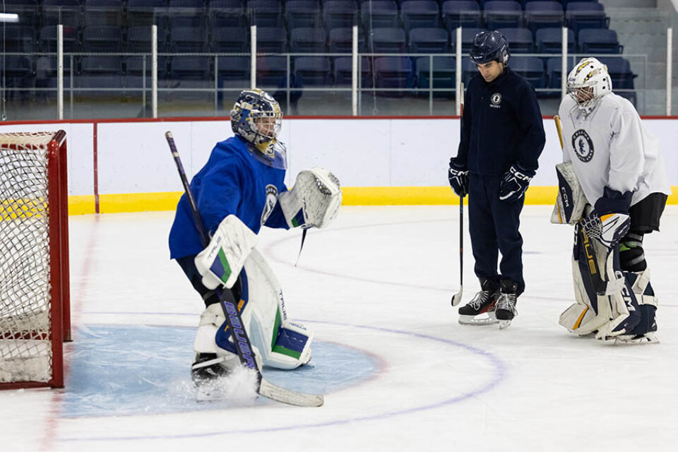 Hockey goalkeeper coaching, Montreal college sports photography
