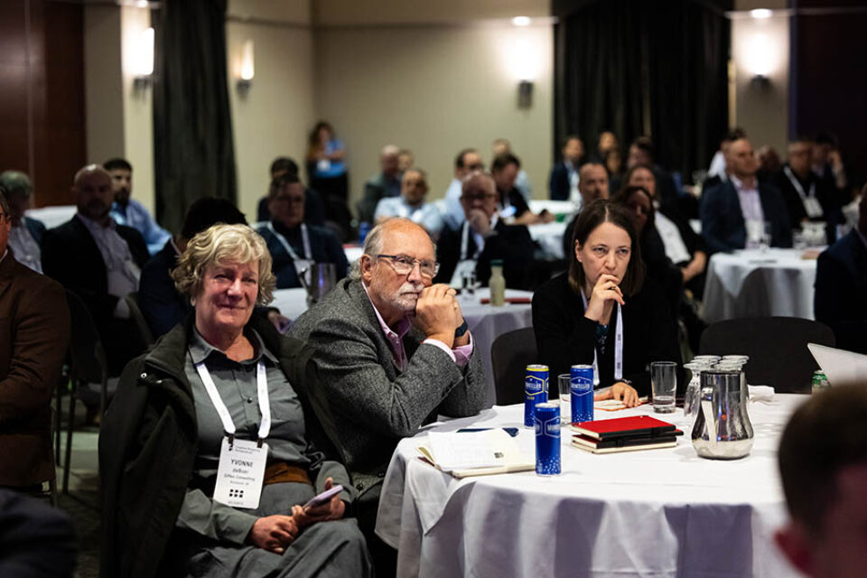 Audience listens to presenter at a Montreal conference