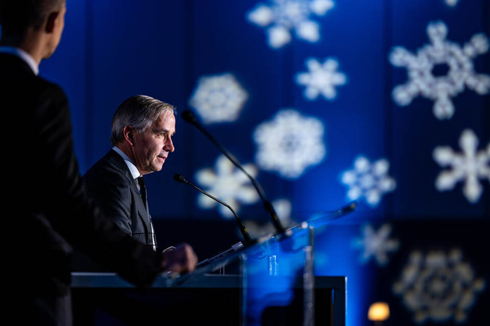 Ottawa event photographer shot of a keynote speaker at a company Xmas event