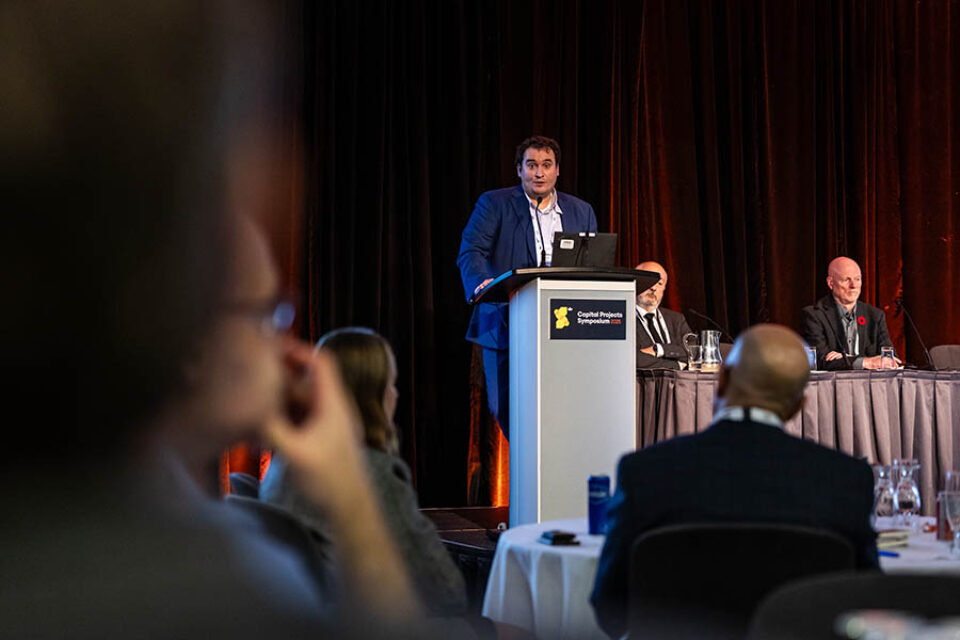 Presenter addresses event delegates, Montreal event photography