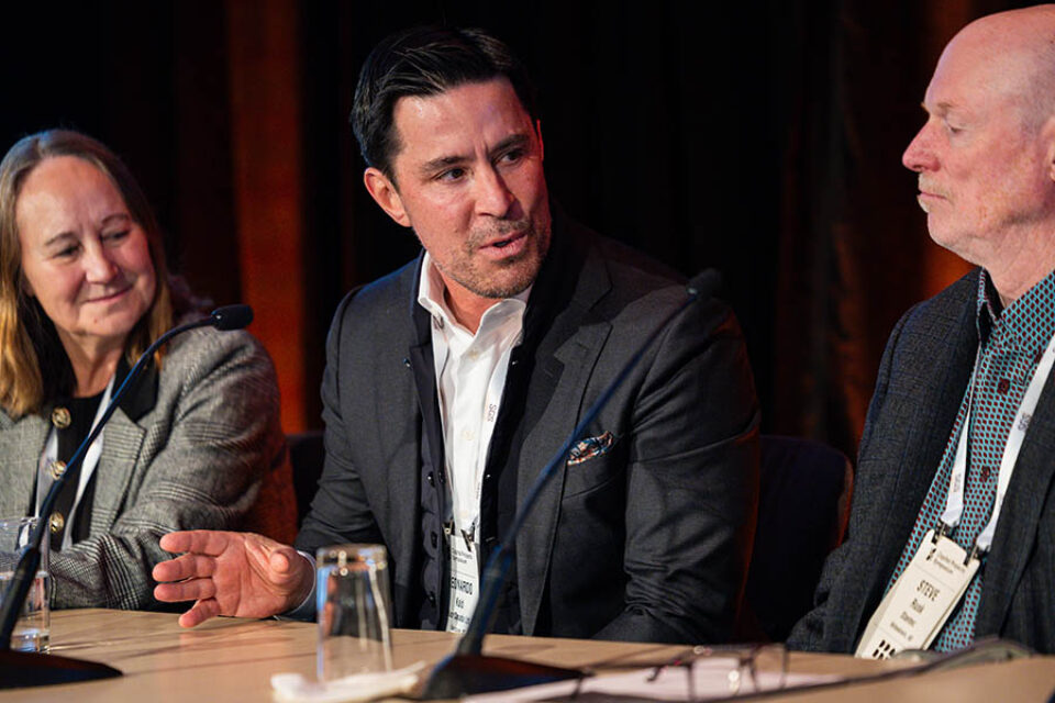 Event panelists in discussion at a Montreal conference
