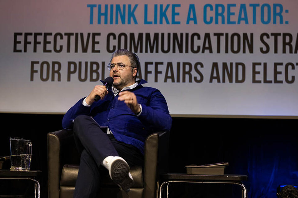 Event speaker onstage, Montreal summit photography