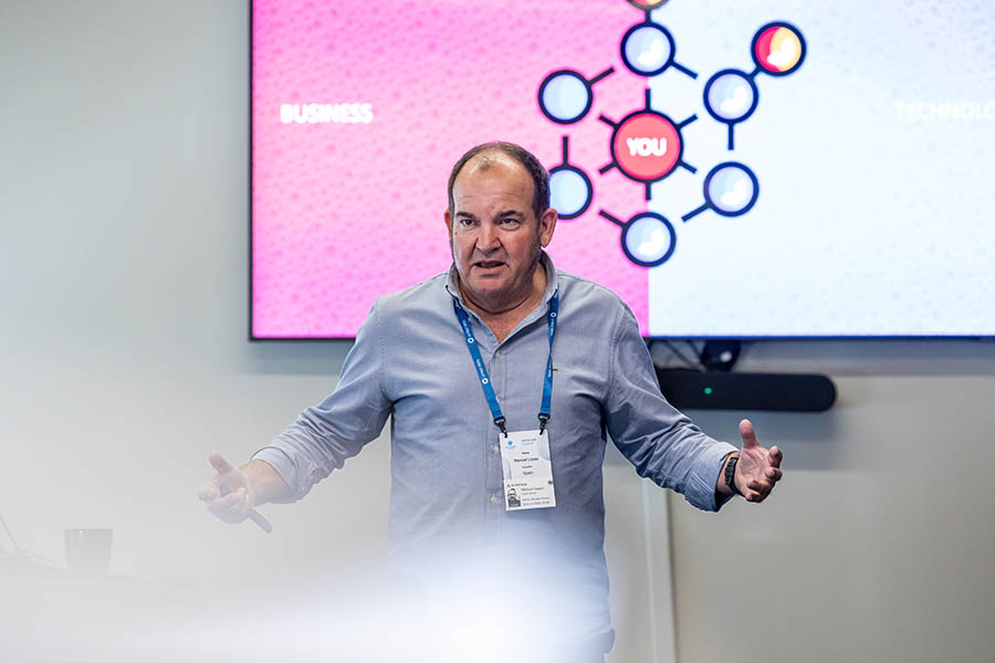 Photograph of man giving business workshop in Montreal
