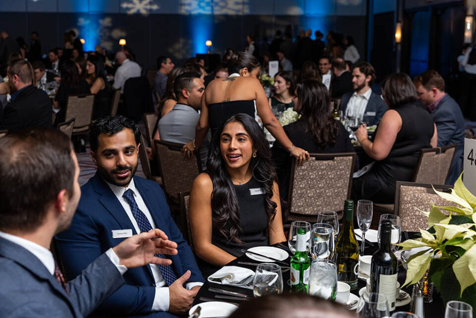 Event guests chat at dinner, Ottawa event photographer