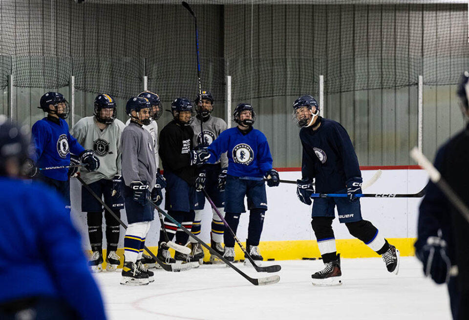 College hockey players having fun - Montreal college sports photography