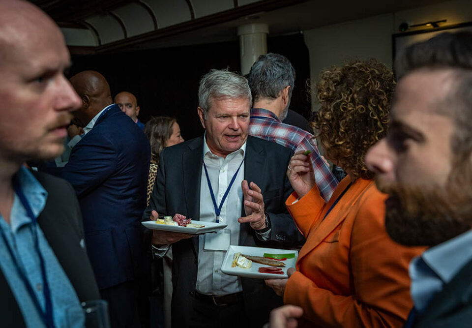 Guests attend a business networking event in Montreal