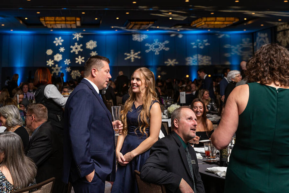 Ottawa event photography, socialising at the company Christmas party