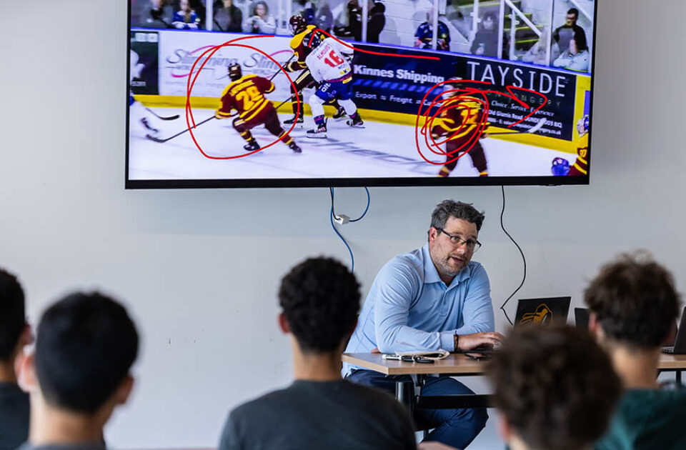 College hockey theory class, by Montreal college sports photographer
