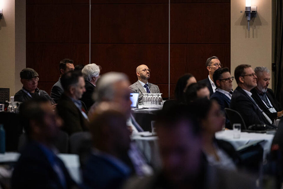 Montreal conference audience listening to speaker