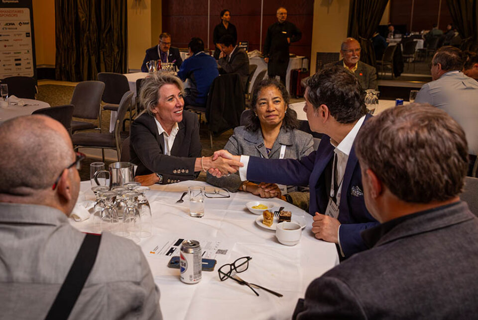 Conference delegates networking, Montreal conference photography