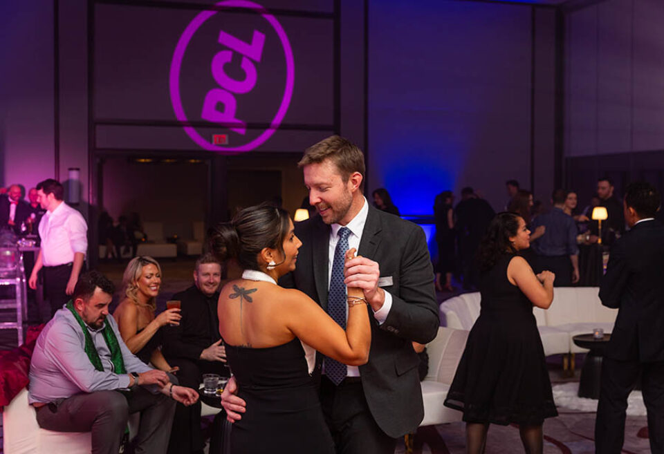 Couple dancing, business Xmas party in Ottawa