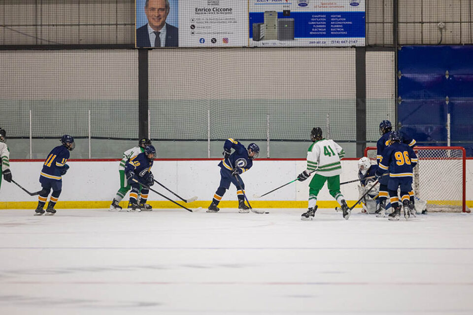 College hockey game shot by Montreal college sports photographer