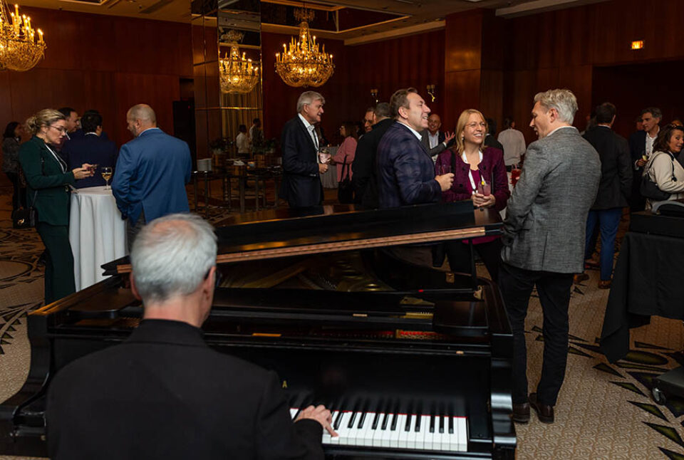 Pianist plays for business event guests